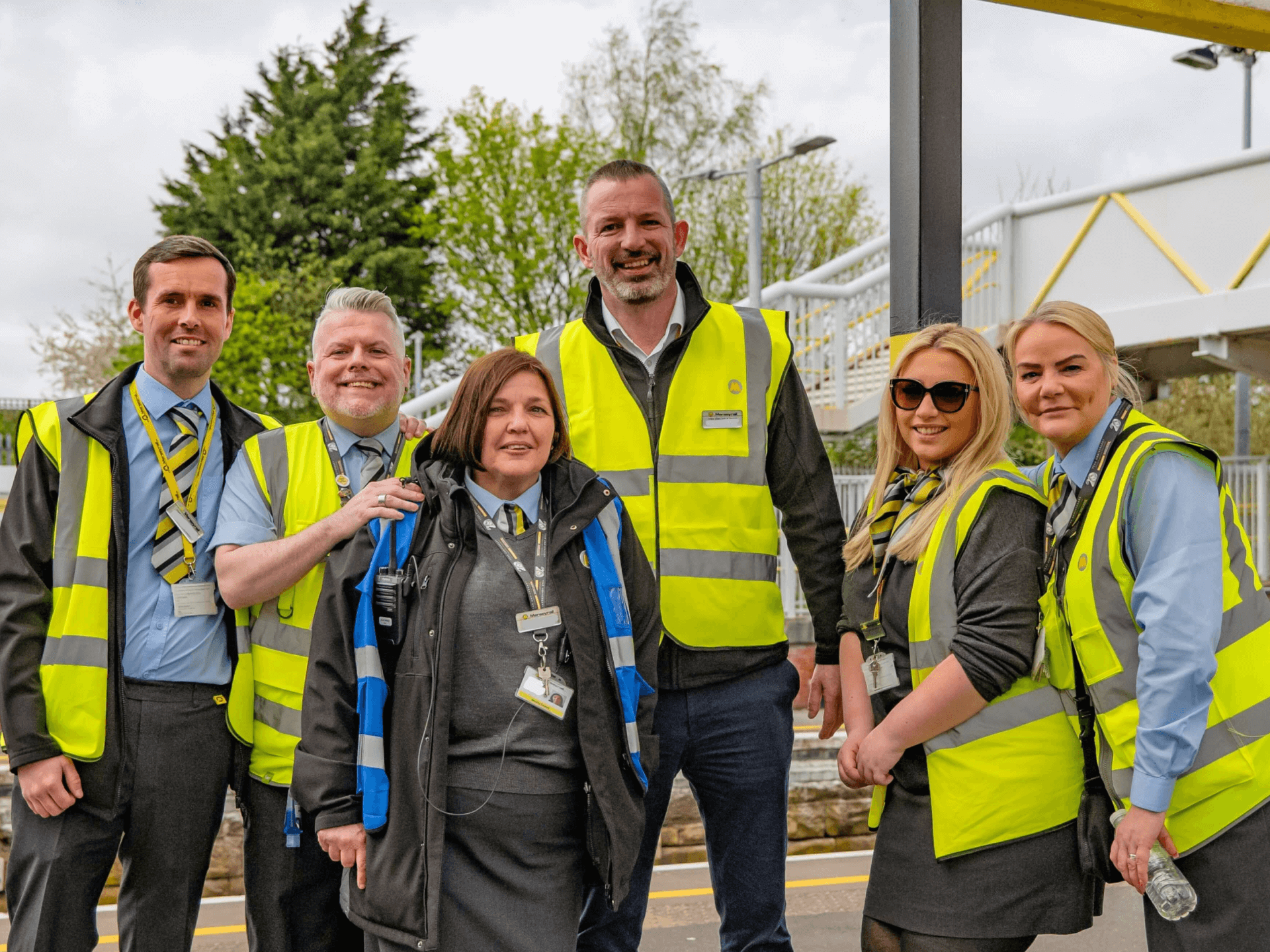 Merseyrail team photo on railway platform